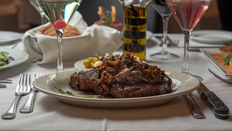 Steak entree smothered with mushroom and onions